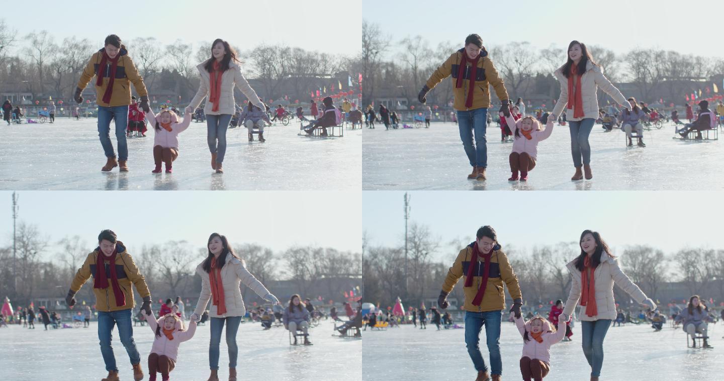 快乐家庭在冰上玩耍