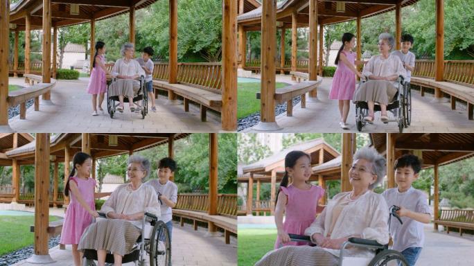 孙子孙女给老人推轮椅