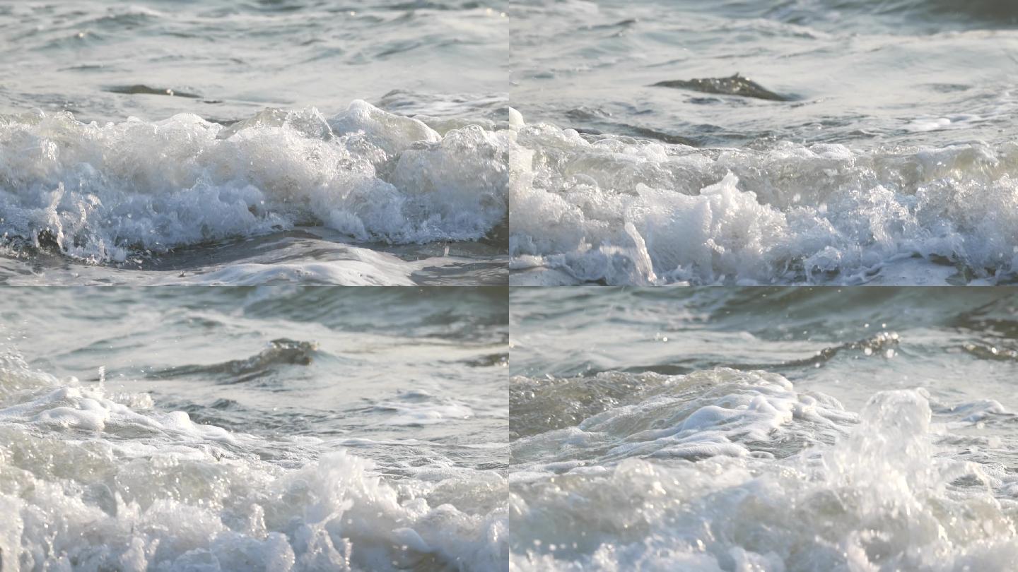 大海冲击浪花翻滚流动的水泉水