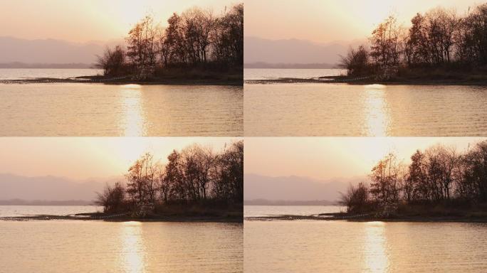 4K冬日夕阳下的湖泊日落自然风光