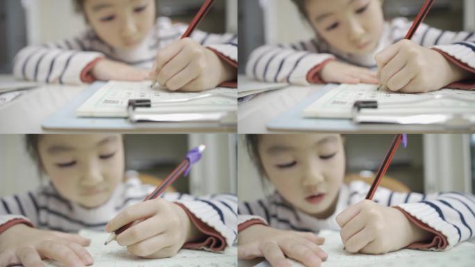 做作业 小孩 女孩 练字 写字 左撇子