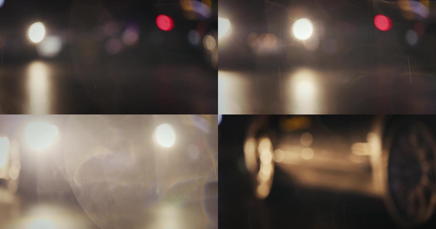 【正版素材】都市夜晚车灯逆光雨滴虚化光斑