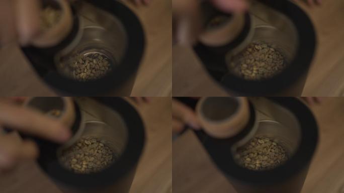 生咖啡豆倒入烘焙机开始烘焙