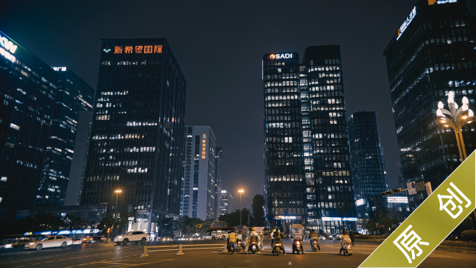 城市夜晚写字楼亮灯加班人群都市高楼建筑群