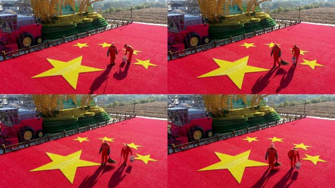 环卫工人打扫清理国旗地毯 普通劳动者