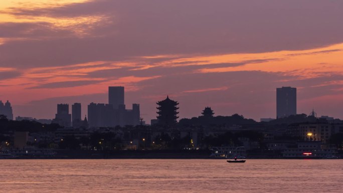 城市风光朝霞在黄鹤楼上飘荡