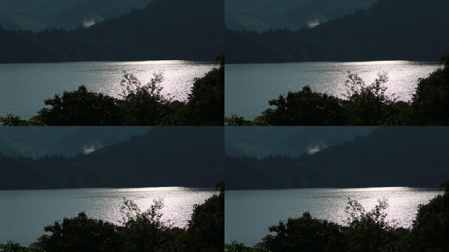 夕阳下湖面水面波光粼粼原素材