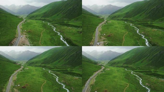 新疆天山雪山草原溪流独库公路航拍视频素材