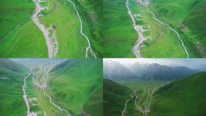 新疆天山雪山草地溪流独库公路航拍视频素材