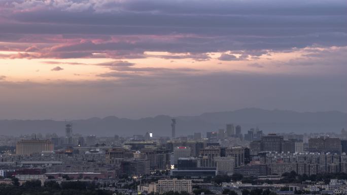 北京高楼群与奥林匹克塔晚霞日转夜延时摄影