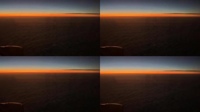 飞机窗外日出飞机云层云端景色云层之上天空