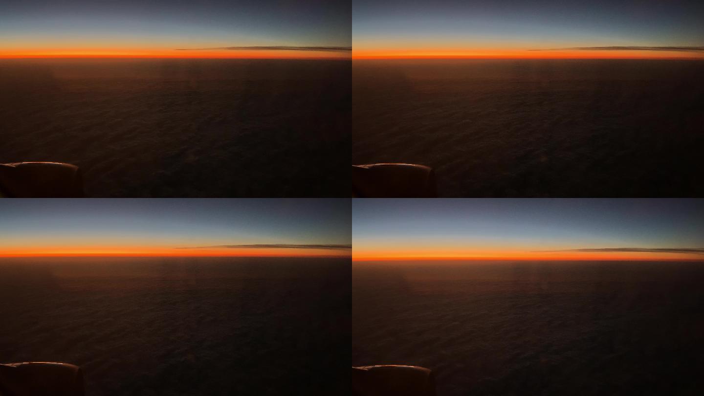 飞机窗外日出飞机云层云端景色云层之上天空