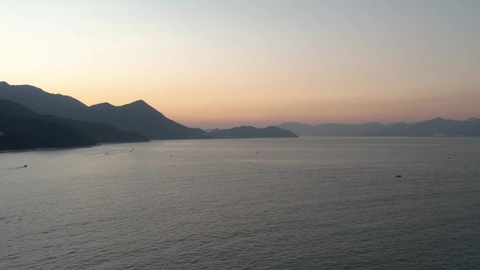 航拍深圳大鹏大海鹿嘴山庄夕阳海景晚霞快艇