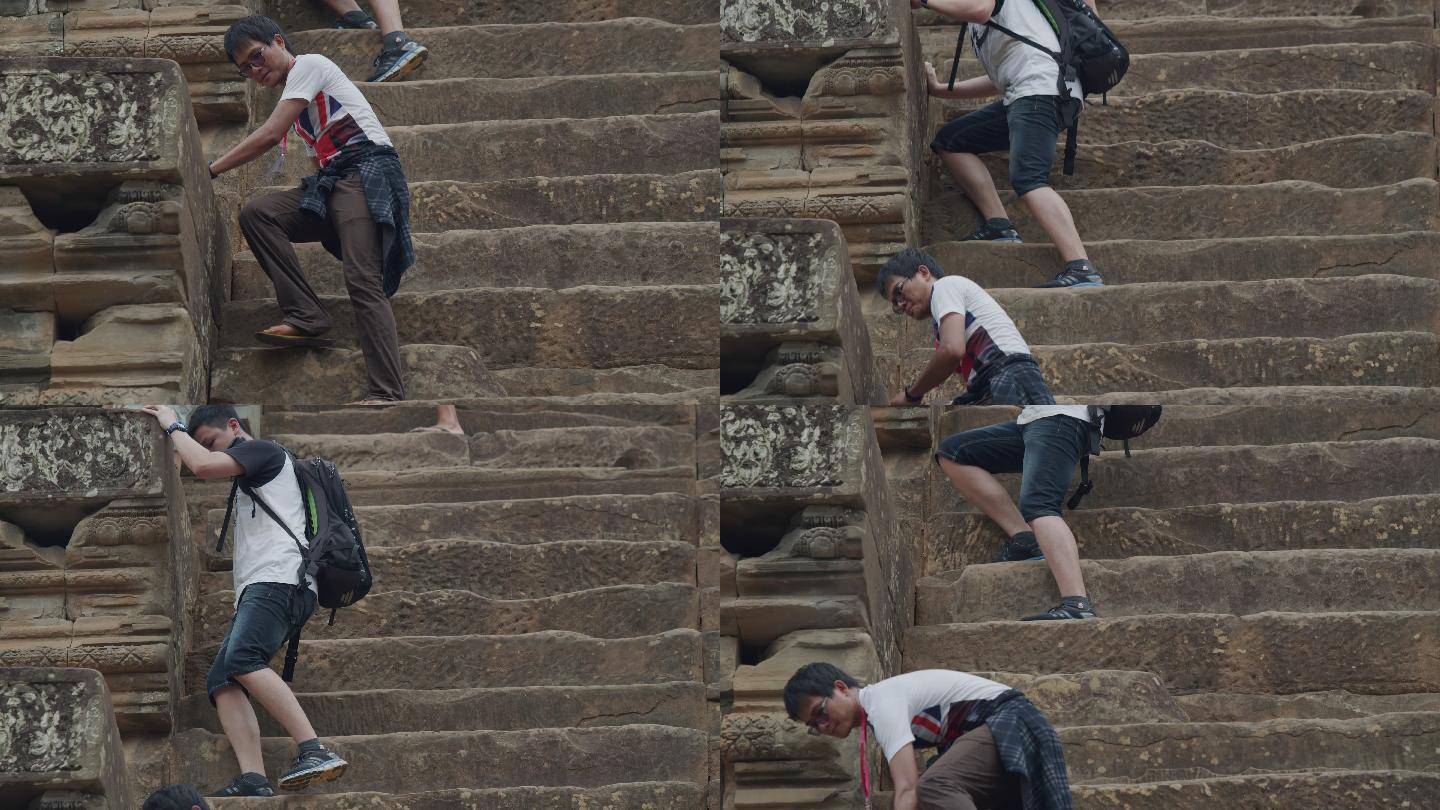 柬埔寨吴哥窟的茶胶寺 游客走台阶