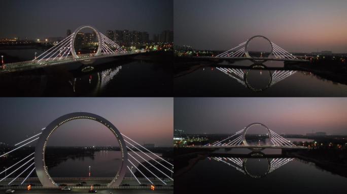 4K航拍夜晚的郑州网红打卡地戒指桥