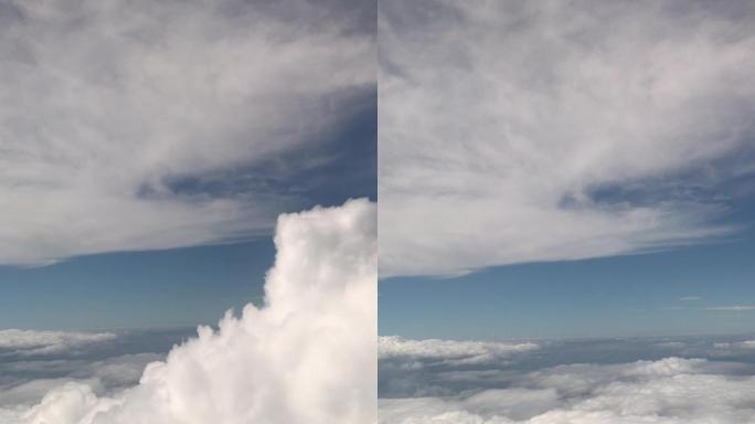 高空在云层里飞行穿越云海