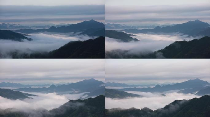 静谧的山顶云雾袅绕，白云翻滚