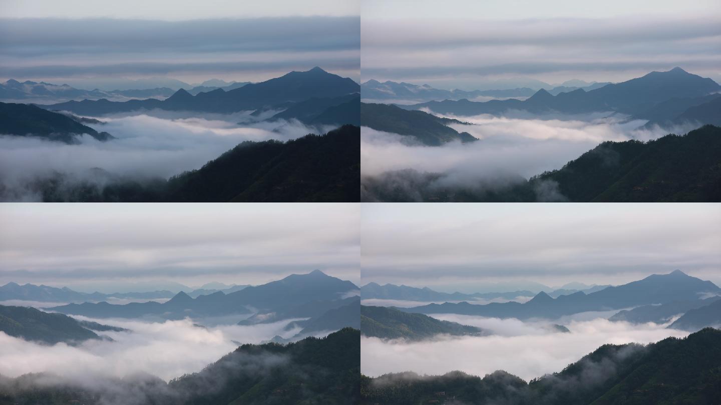 静谧的山顶云雾袅绕，白云翻滚
