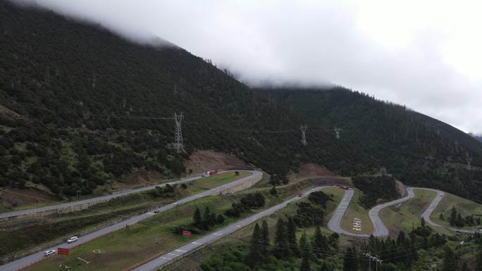 西藏航拍国道318天路十八弯山脉盘山公路
