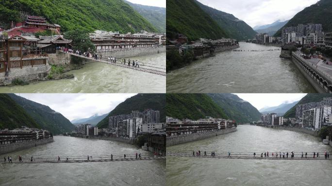 西藏历史景点泸定桥湍急河流铁索桥大山航拍