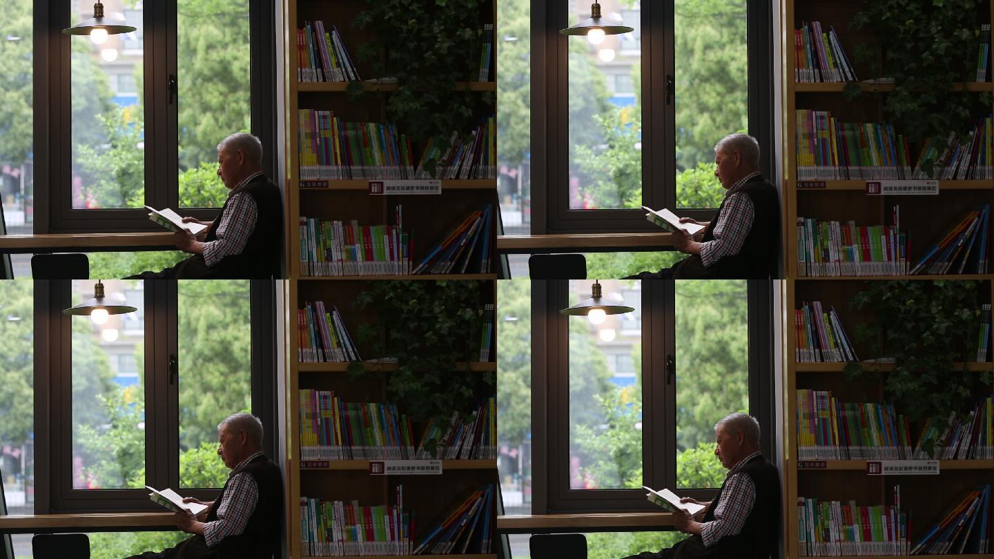 书店老人在窗口看书温馨原素材