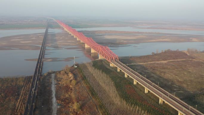 2k郑州黄河火车铁路桥秋景航拍大景素材