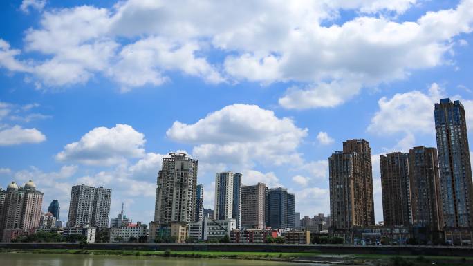 绵阳城市建筑涪江蓝天白云变焦延时空镜