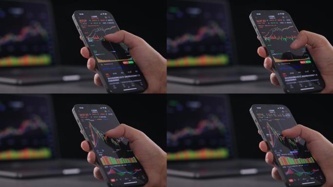 【8K正版素材】金融股票黑背景使用手机