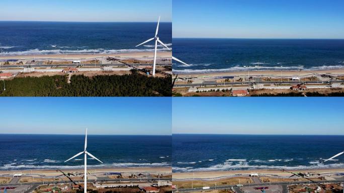 航拍大海边风景风力发电