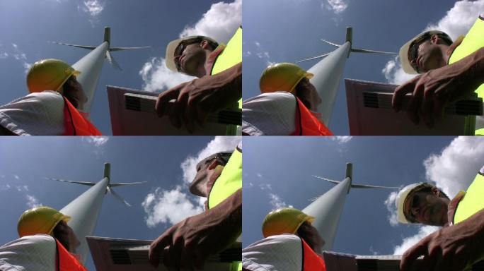 工程师观察风力涡轮机