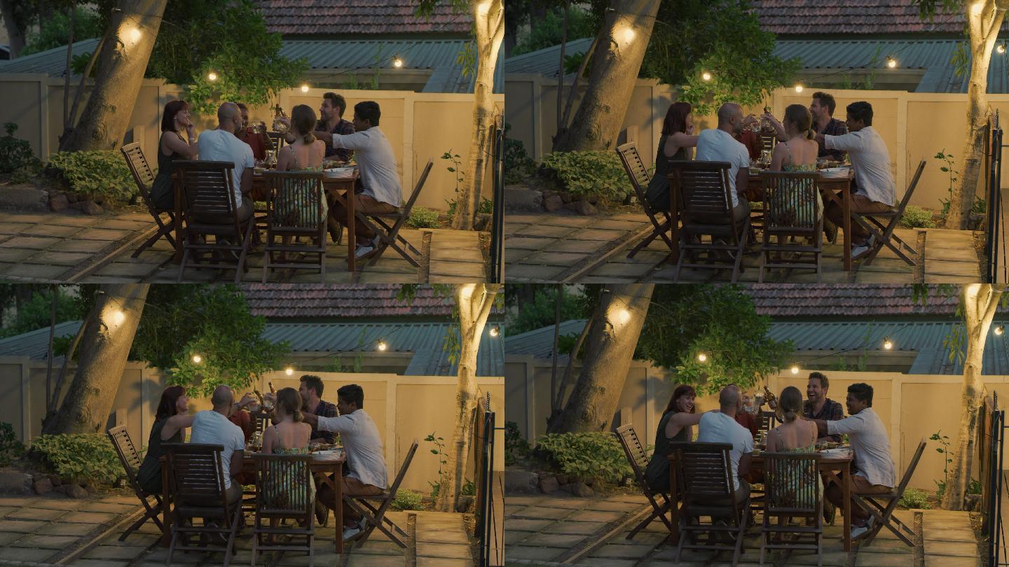 年轻朋友在户外晚宴上举杯祝酒的视频