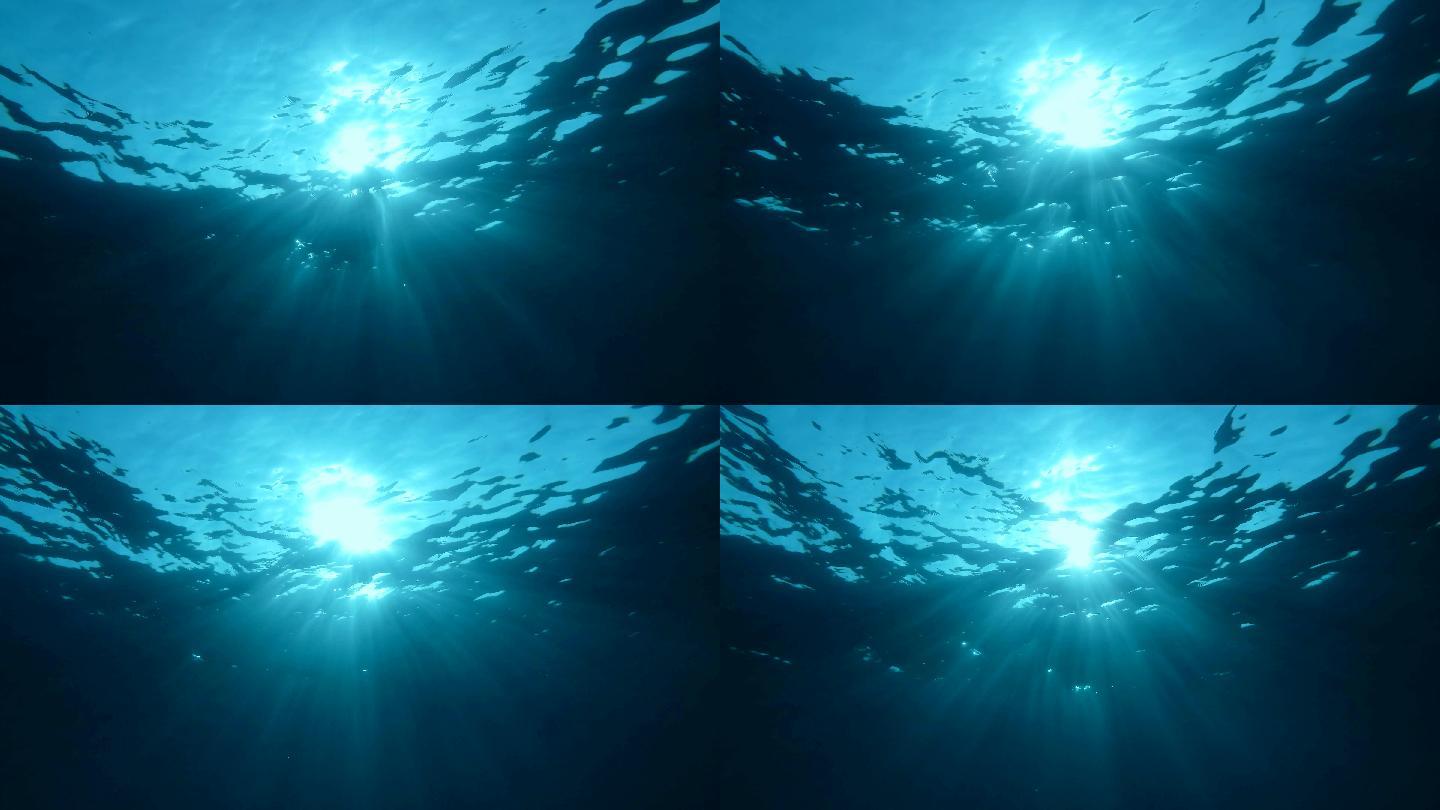 慢镜头，阳光穿过海面，水下拍摄