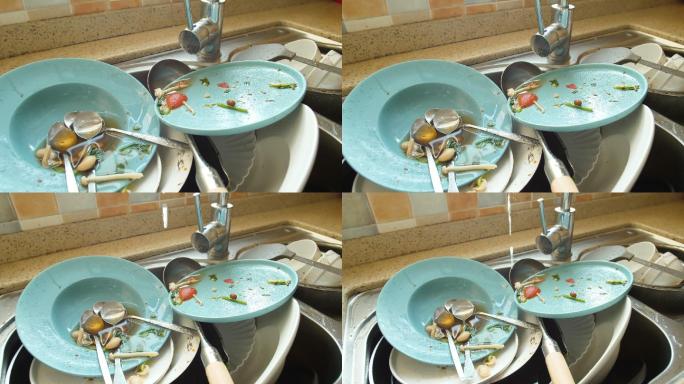 厨房里的脏盘子盘子清洗