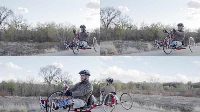 骑自行车的男人晨跑运动健康生活公园锻炼