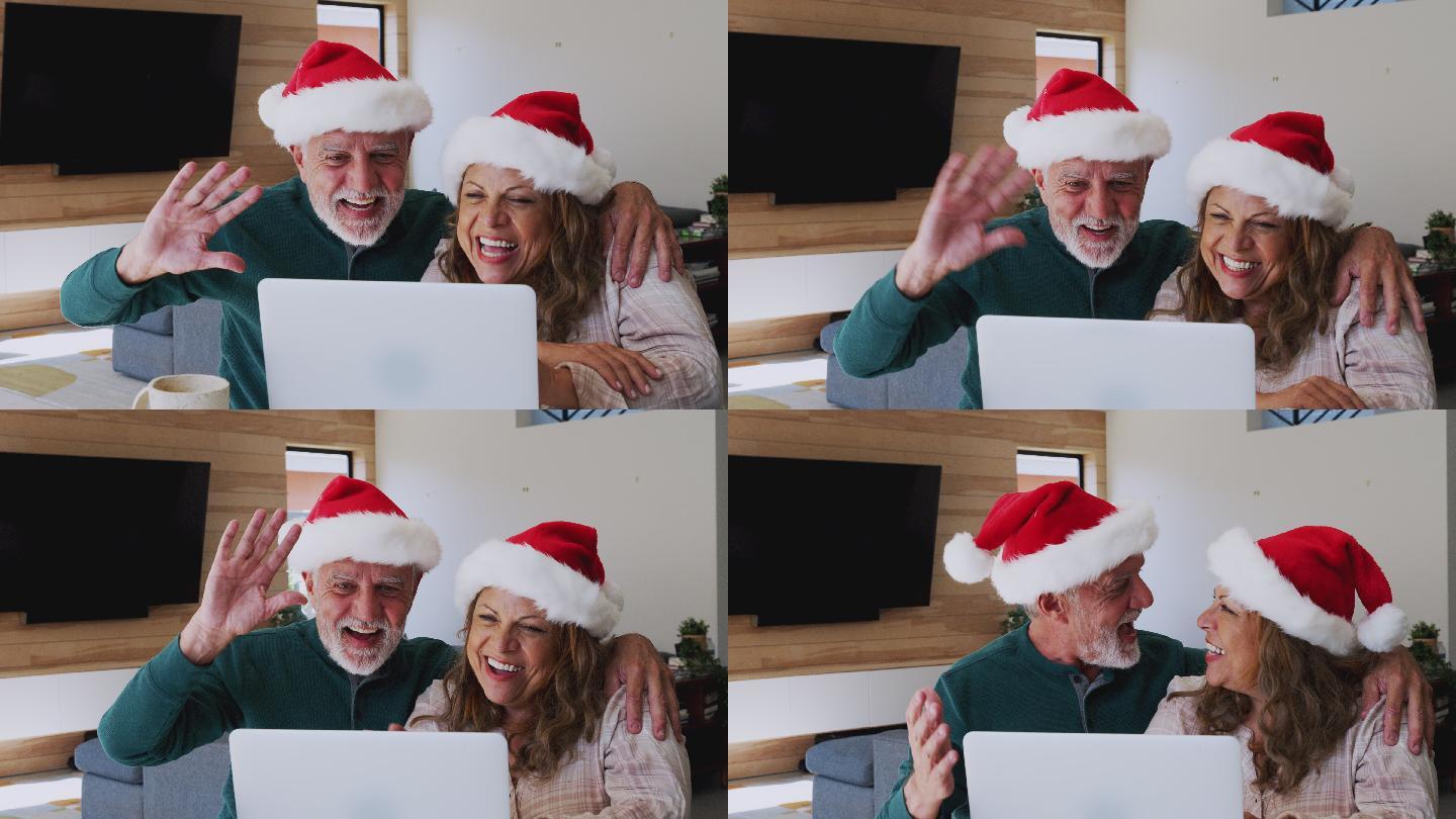 一对夫妇在圣诞节与家人视频聊天
