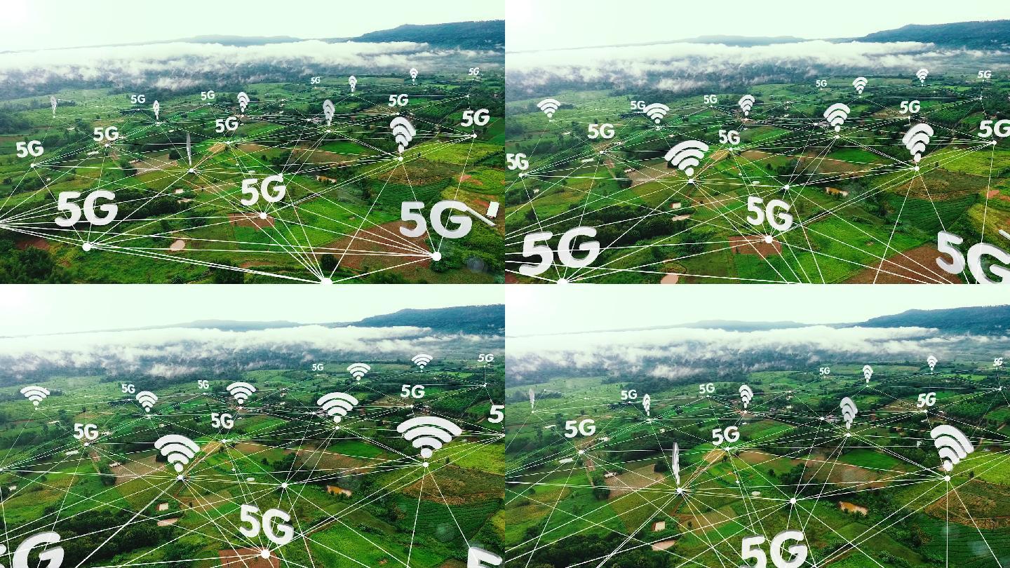 5G技术图标，位于山区附近的绿色农田上。