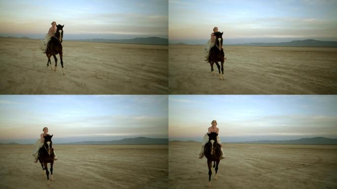 金发女郎骑着一匹马穿越沙漠