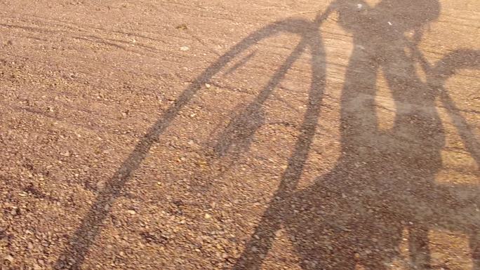 阳光自行车影子户外运动动态动感速度