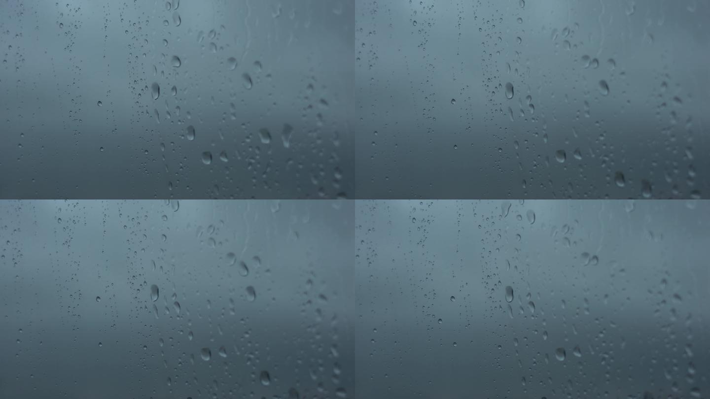 下雨天窗户上的雨滴4K