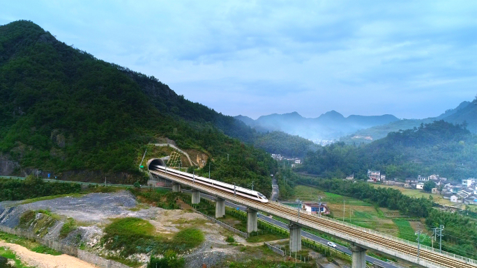 航拍高铁动车和谐号复兴号皖南山区村庄隧道