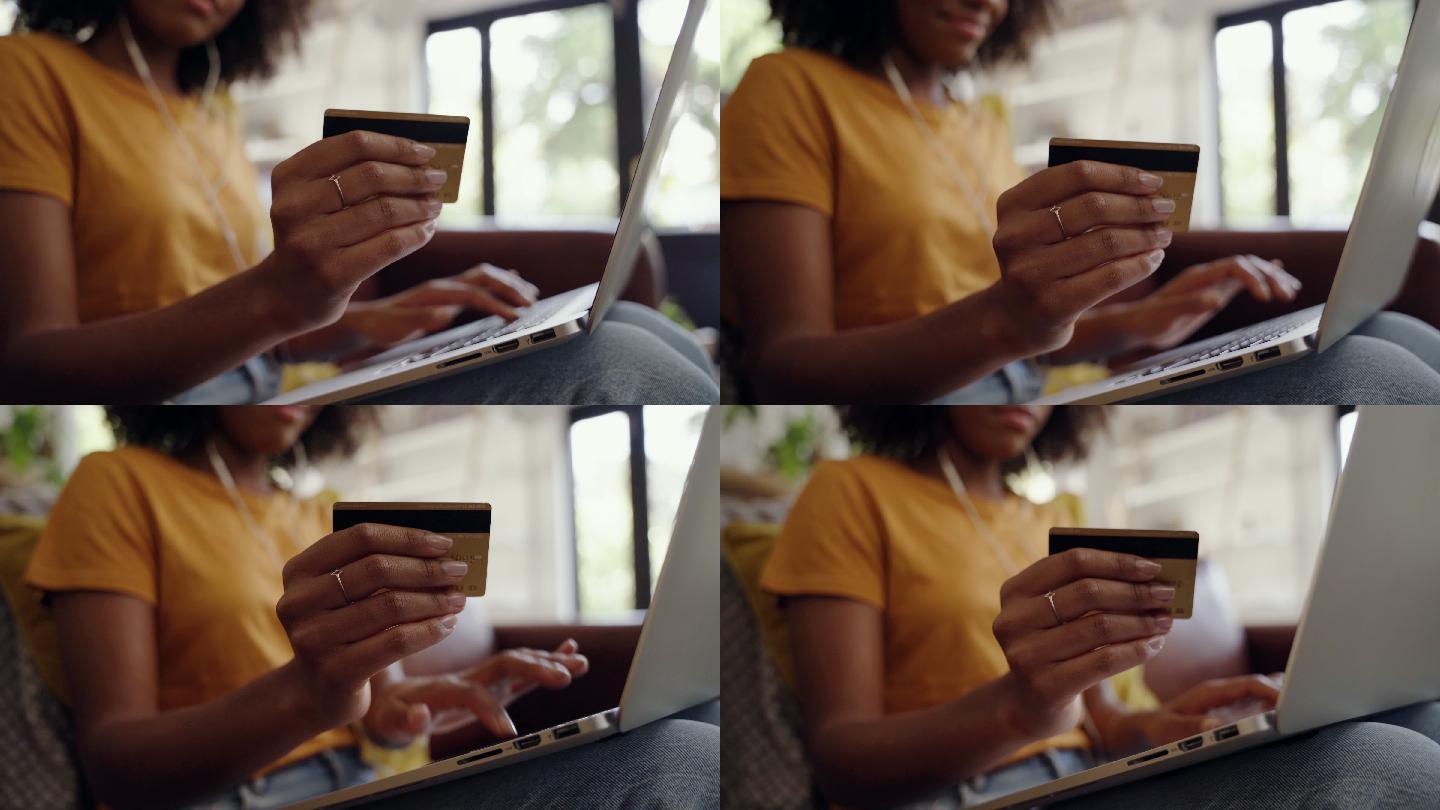 一名妇女手持信用卡的特写镜头