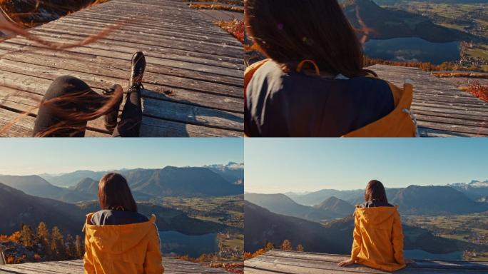 女子坐在月台边，欣赏阳光明媚的山景