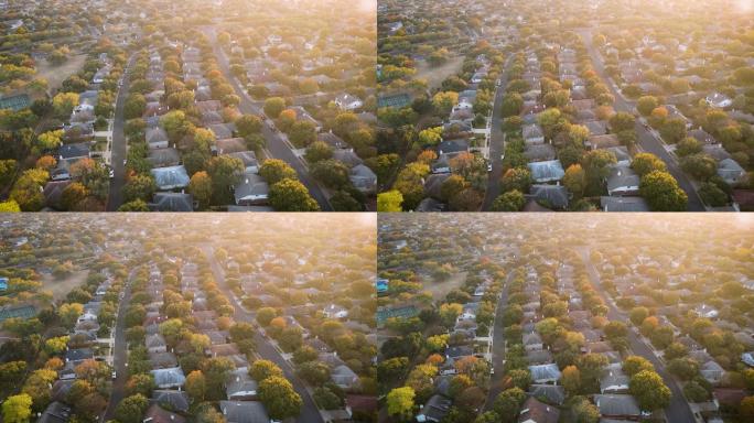 郊区的夕阳镜头照亮了成千上万的房屋