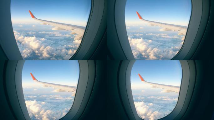 从飞机上看到的机翼和云层