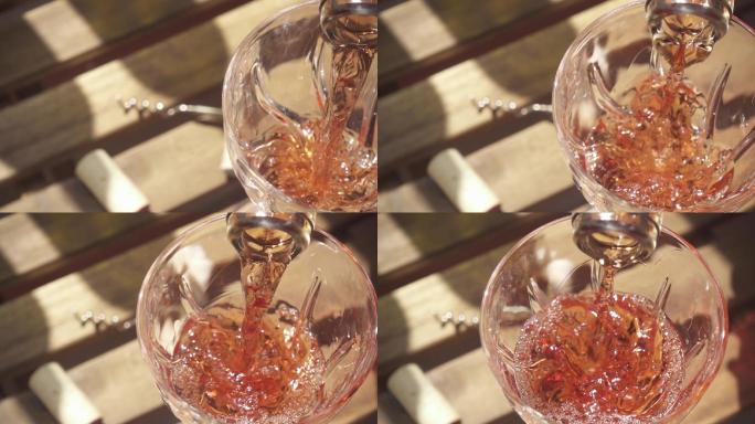 慢动作葡萄酒从瓶颈流入桌上的玻璃杯