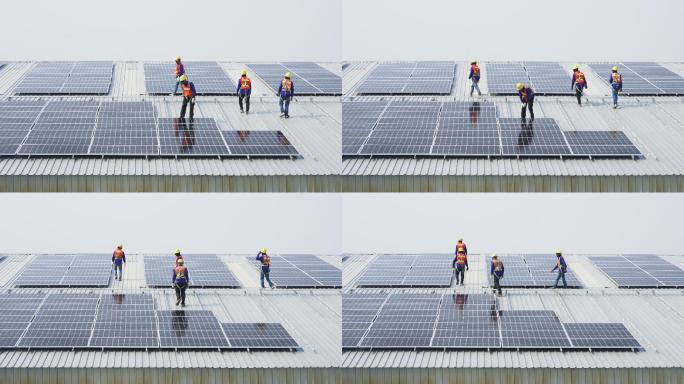 太阳能电池板的工人团队