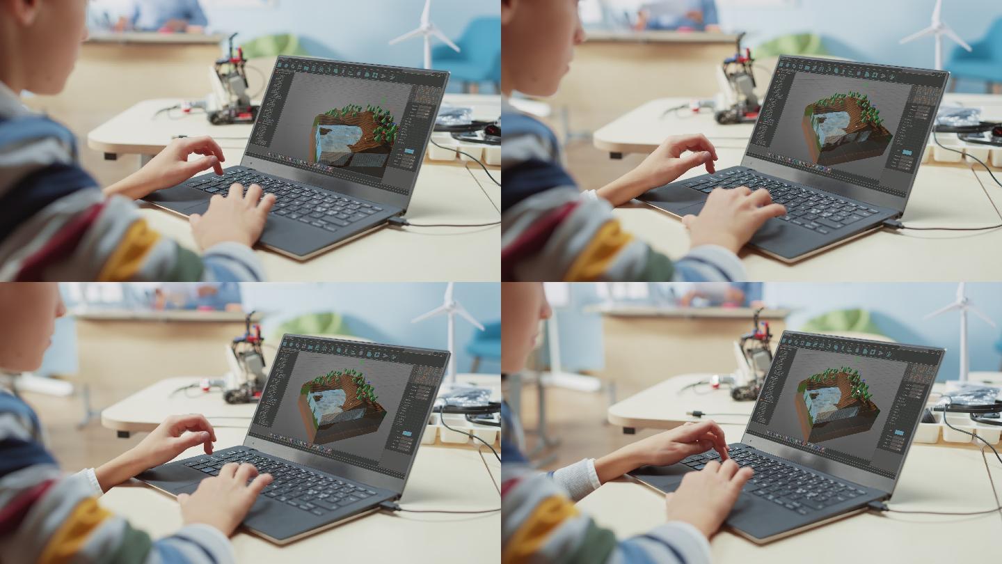 一个孩子使用笔记本电脑设计3D游戏