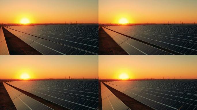 日落时太阳能电池板的无人驾驶飞机视图