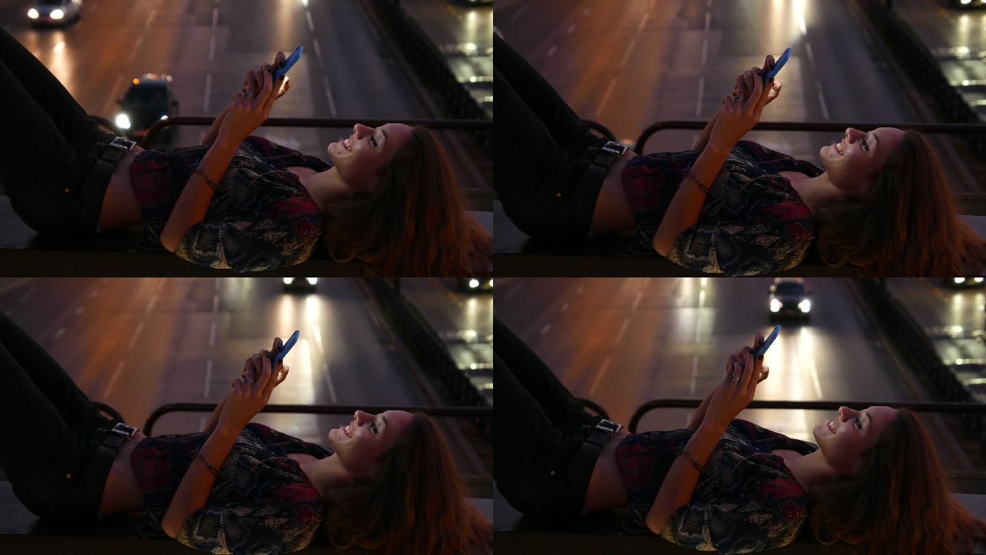 躺着玩手机的女人天桥马路上熬夜不睡觉年轻