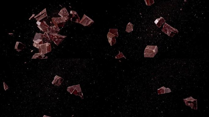 黑巧克力块在空中碰撞超慢动作视频